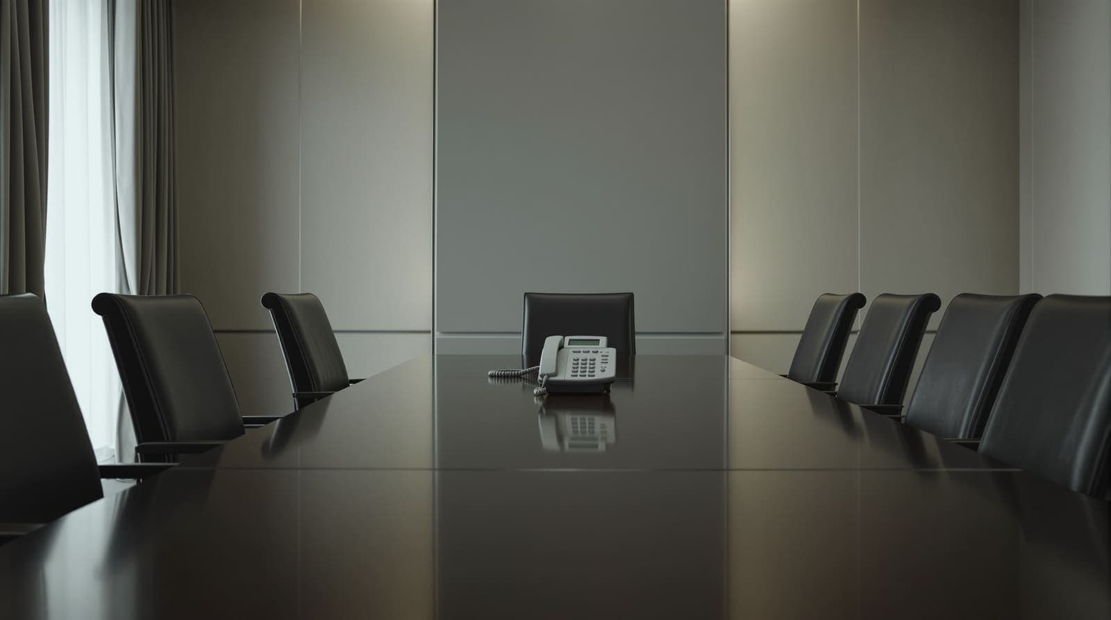Illustration of an empty government meeting room at dawn with a secure telephone on a long polished table.