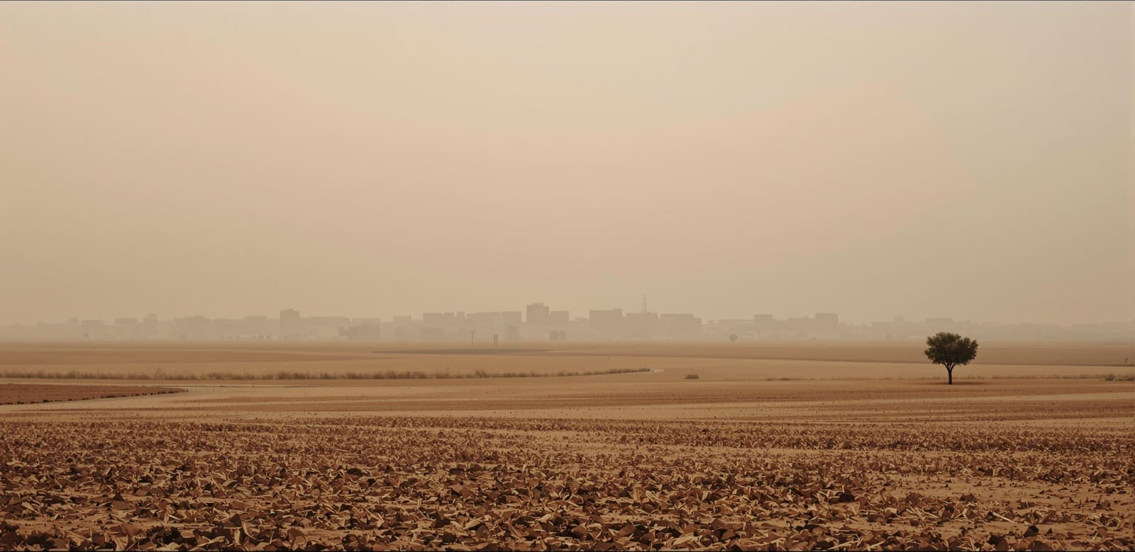 Illustration of a distant hazed southern Gaza skyline seen at dusk across open farmland under soft overcast light.