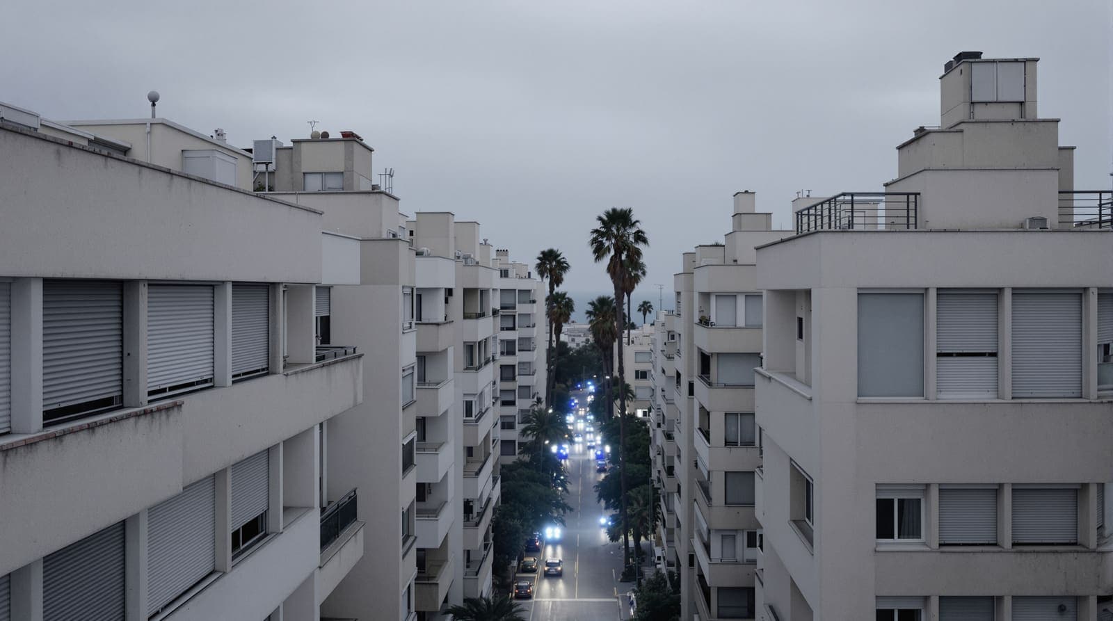 Illustration of the upper storeys of limestone apartment blocks in Netanya at dawn, blue emergency light pulsing up from a street hidden between them.