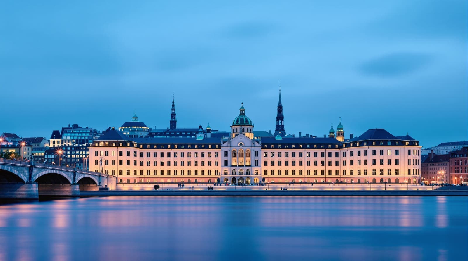 Illustration of Sweden's parliament buildings in central Stockholm seen at dusk from across calm harbour water, with lit windows and an overcast sky.