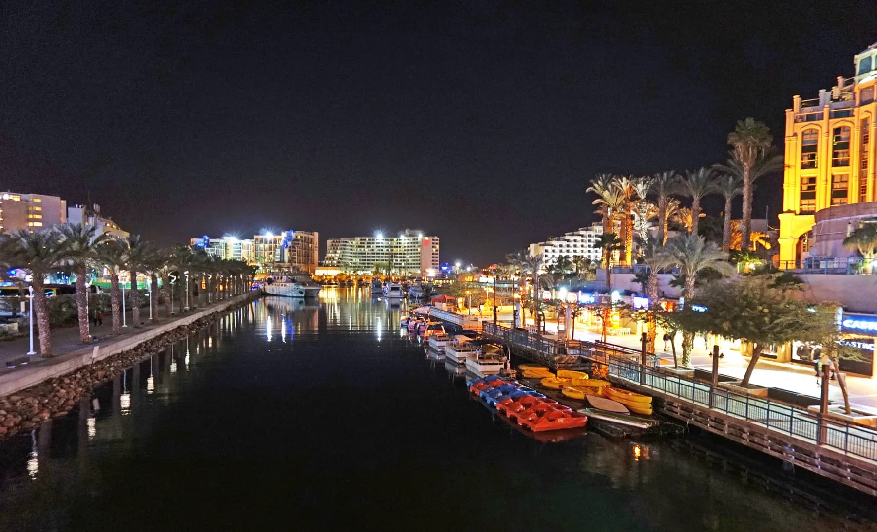 The lagoon in Eilat at night, with the lights of the hotels and the promenade along it
