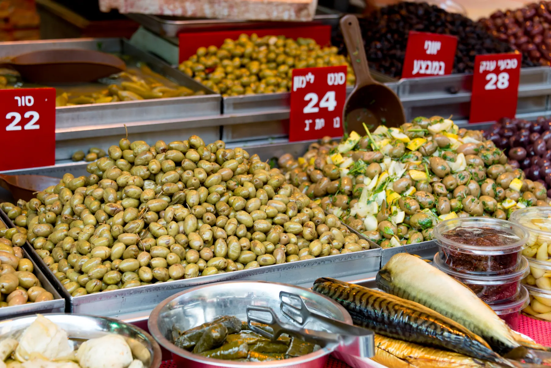 Olives, pickles and fish at a stall in Mahane Yehuda market, Jerusalem