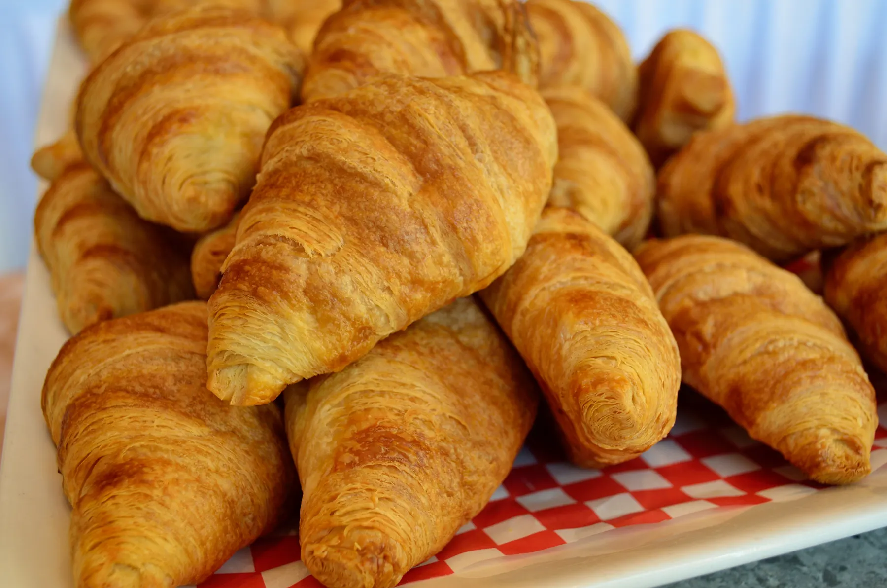 A pile of golden croissants