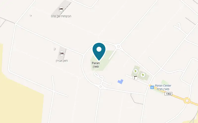 Map showing Caffe In at The centre of Moshav Paran, beside the lawn, Paran
