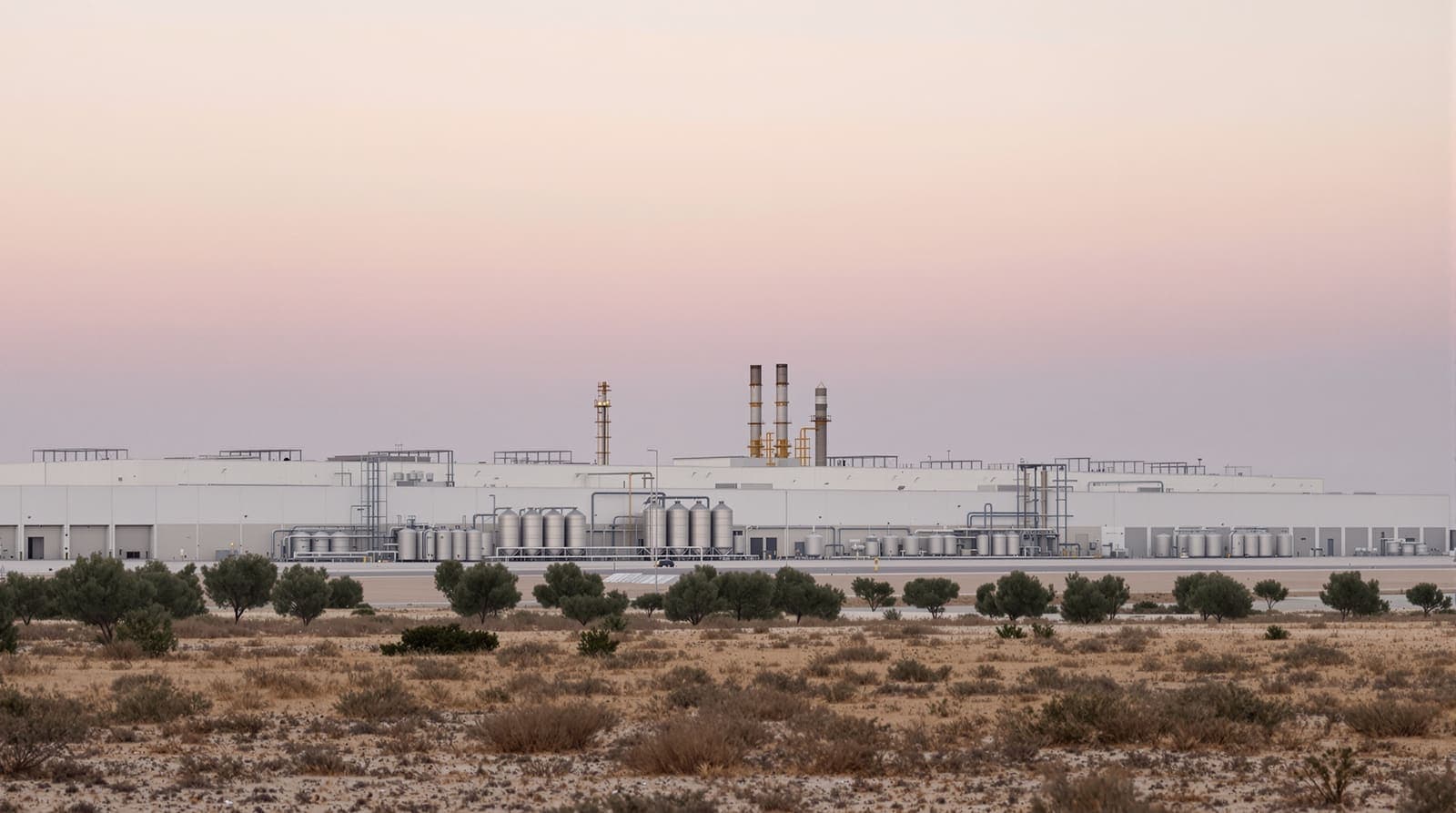 Illustration of a large semiconductor plant with gas tanks and pipe racks on the Negev plain at a still, overcast dawn