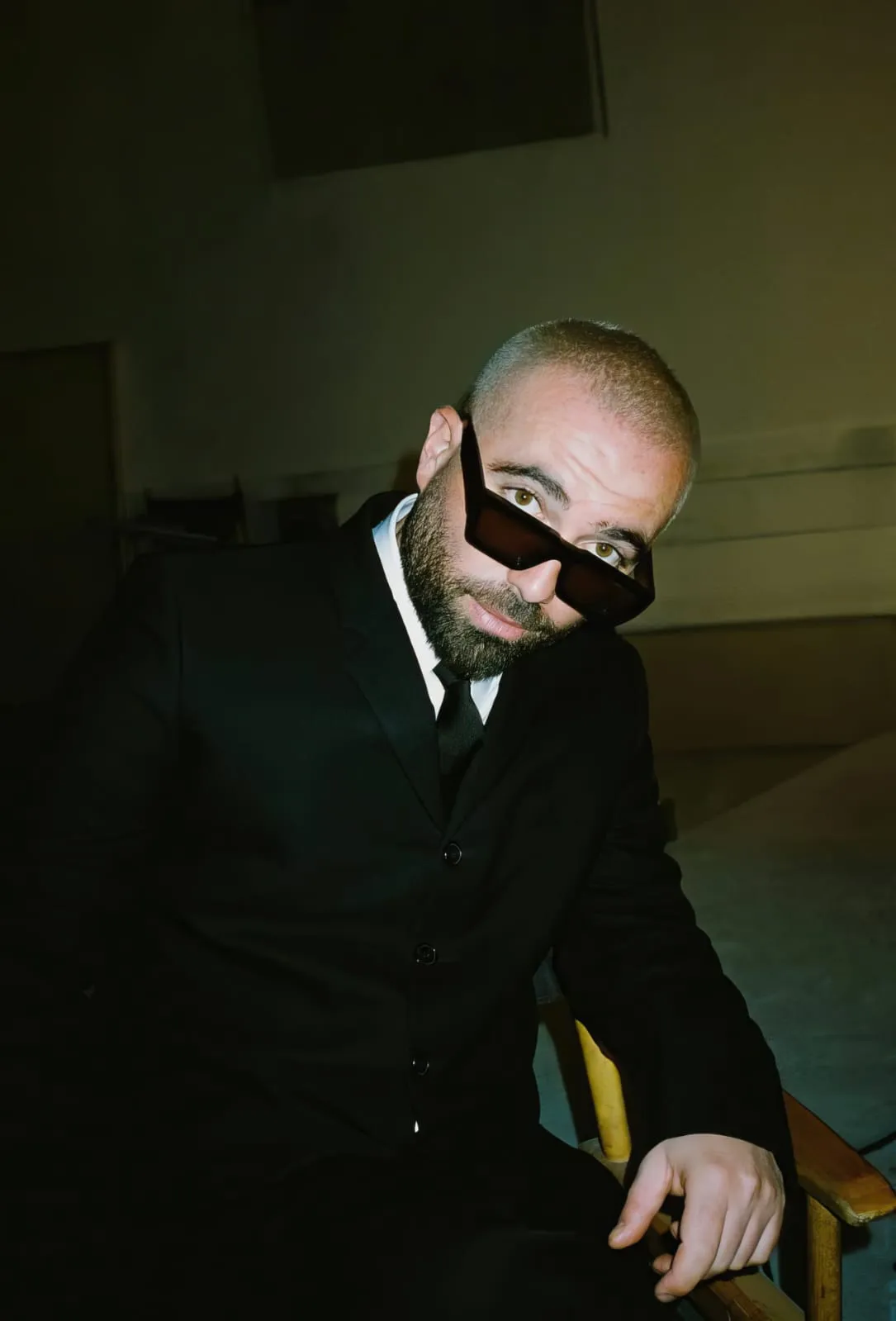 Omer Adam in sunglasses and a dark suit, 2023