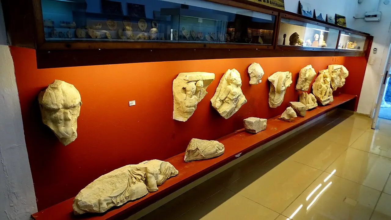 Marble sculpture fragments in a display case at the Caesarea museum in Sdot Yam