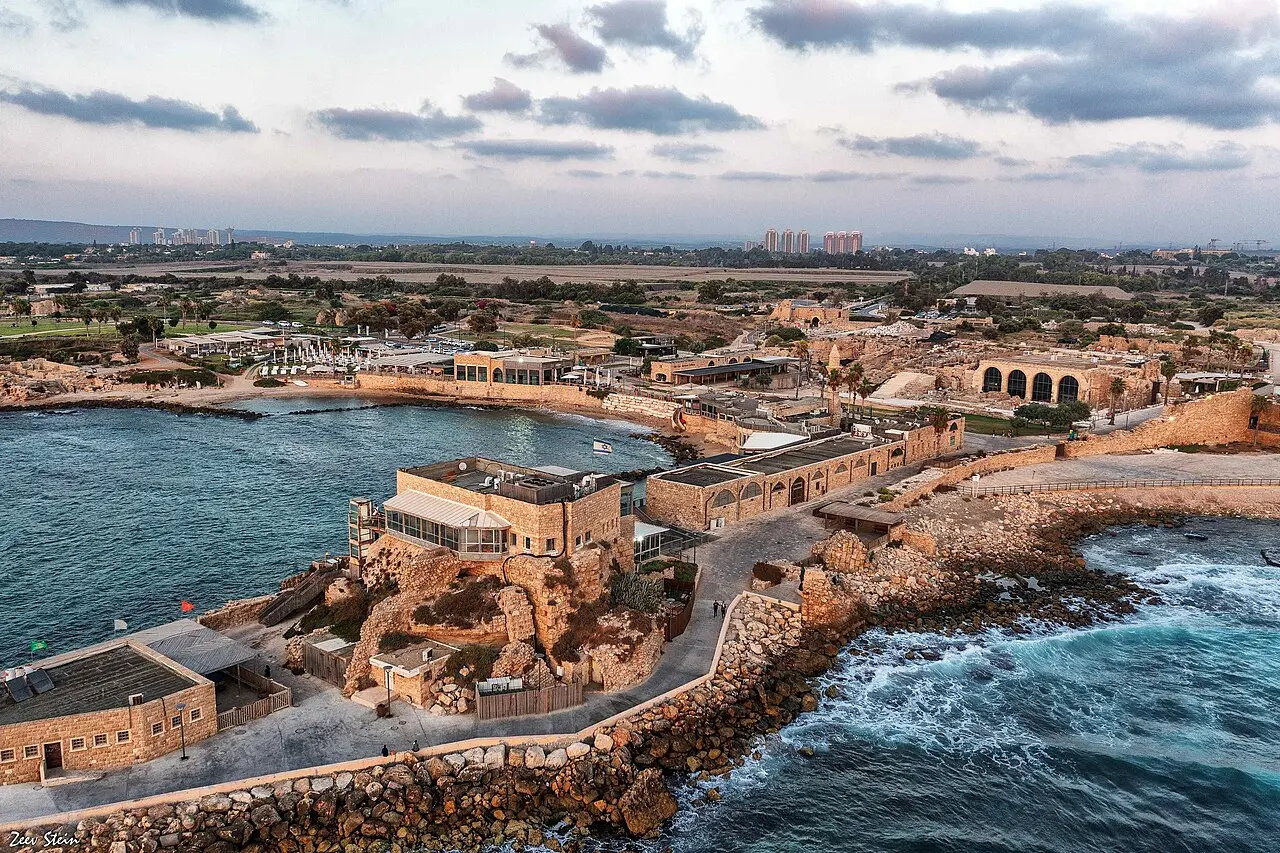 The harbour at Caesarea from the air, with the old port buildings on its promontory