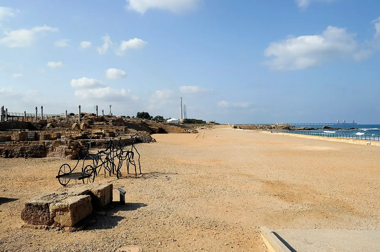 A metal chariot sculpture on the hippodrome floor at Caesarea