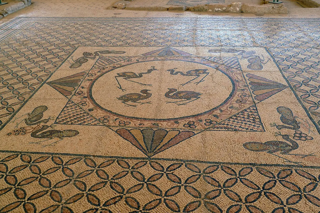 The central medallion of the synagogue's mosaic floor at Ein Gedi, four birds inside interlaced squares