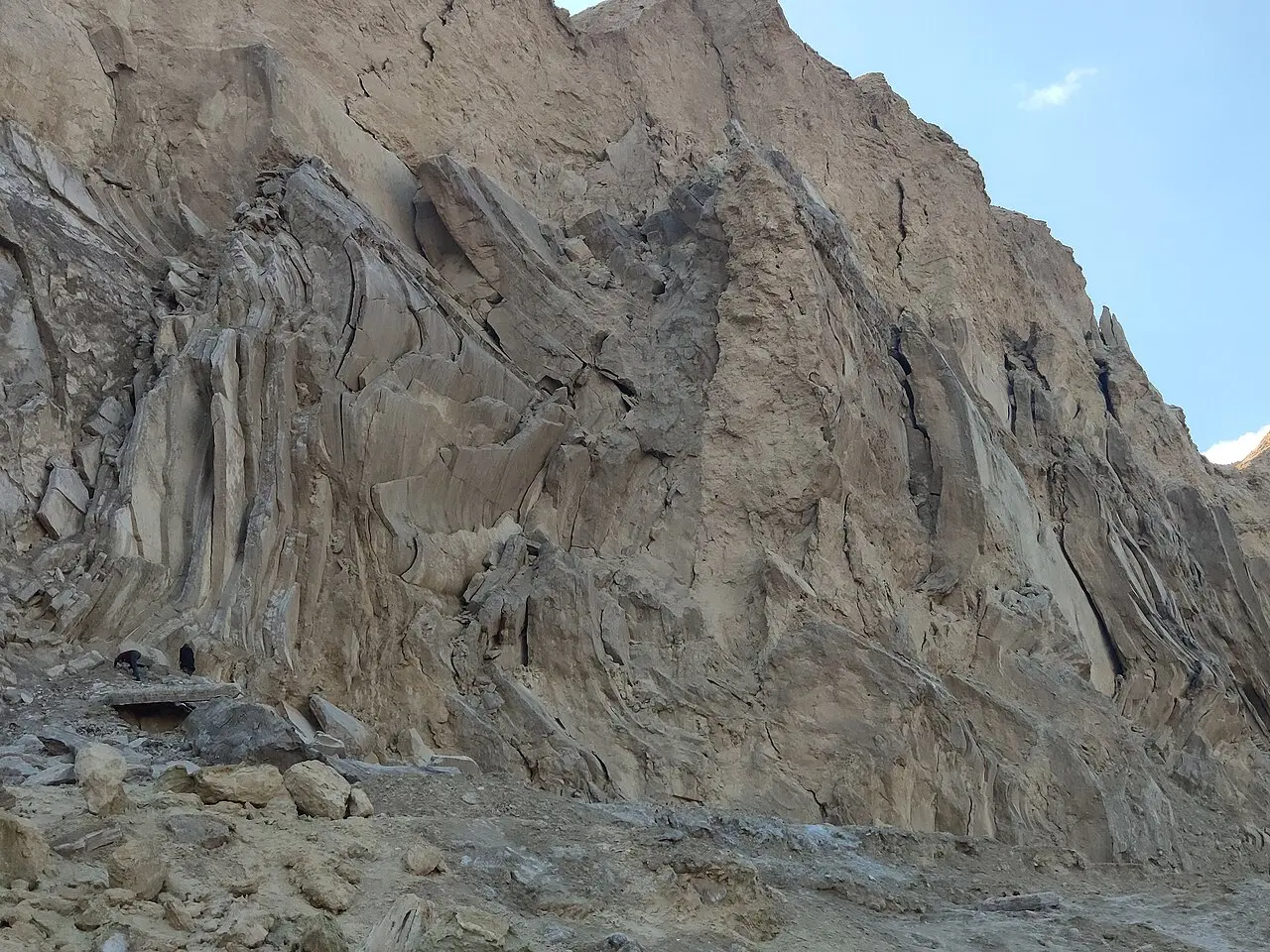 Vertical layers of rock salt exposed on the side of Mount Sodom