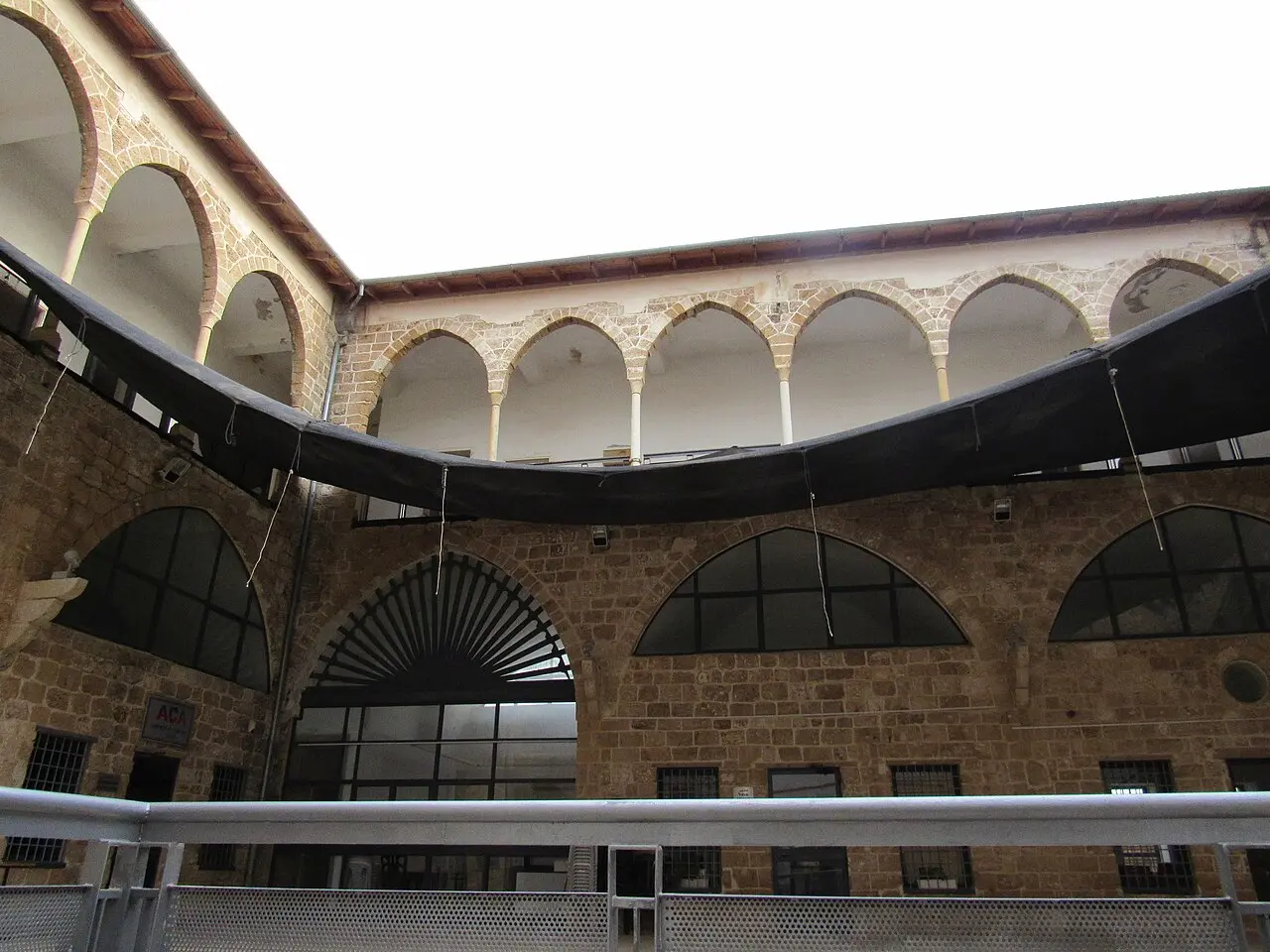 An arcaded Ottoman courtyard in Acre's Old City