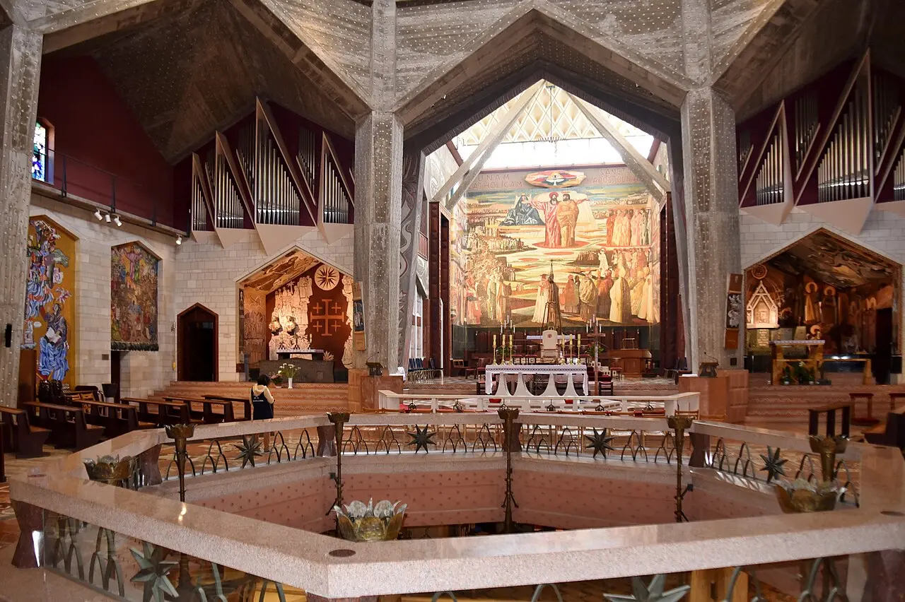 The upper church of the basilica, its floor opened by an octagonal well onto the grotto level below
