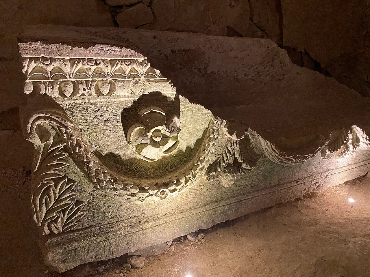 A carved relief on a stone sarcophagus in the burial caves at Beit She'arim