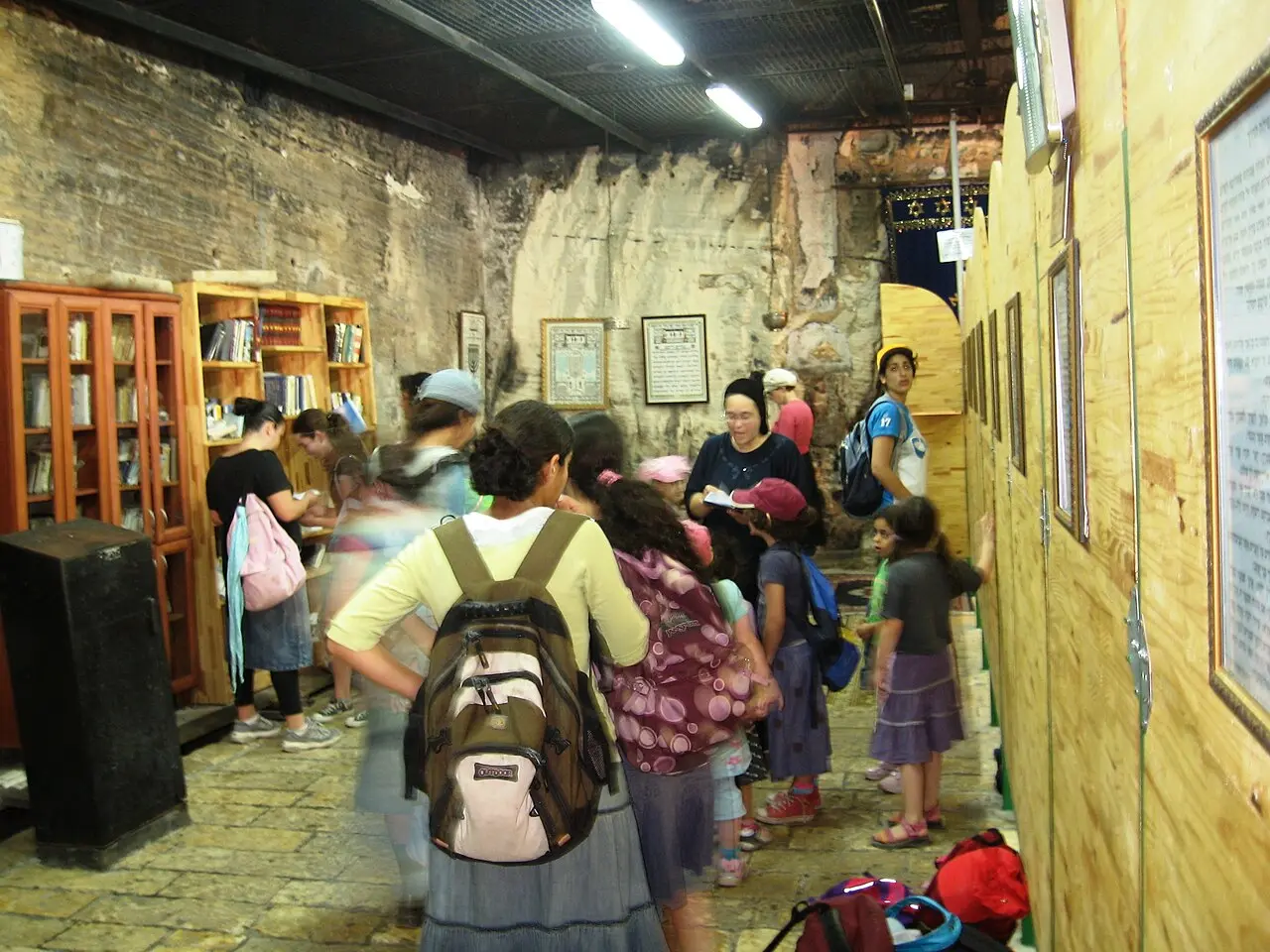 Visitors crowding into Elijah's Cave in Haifa