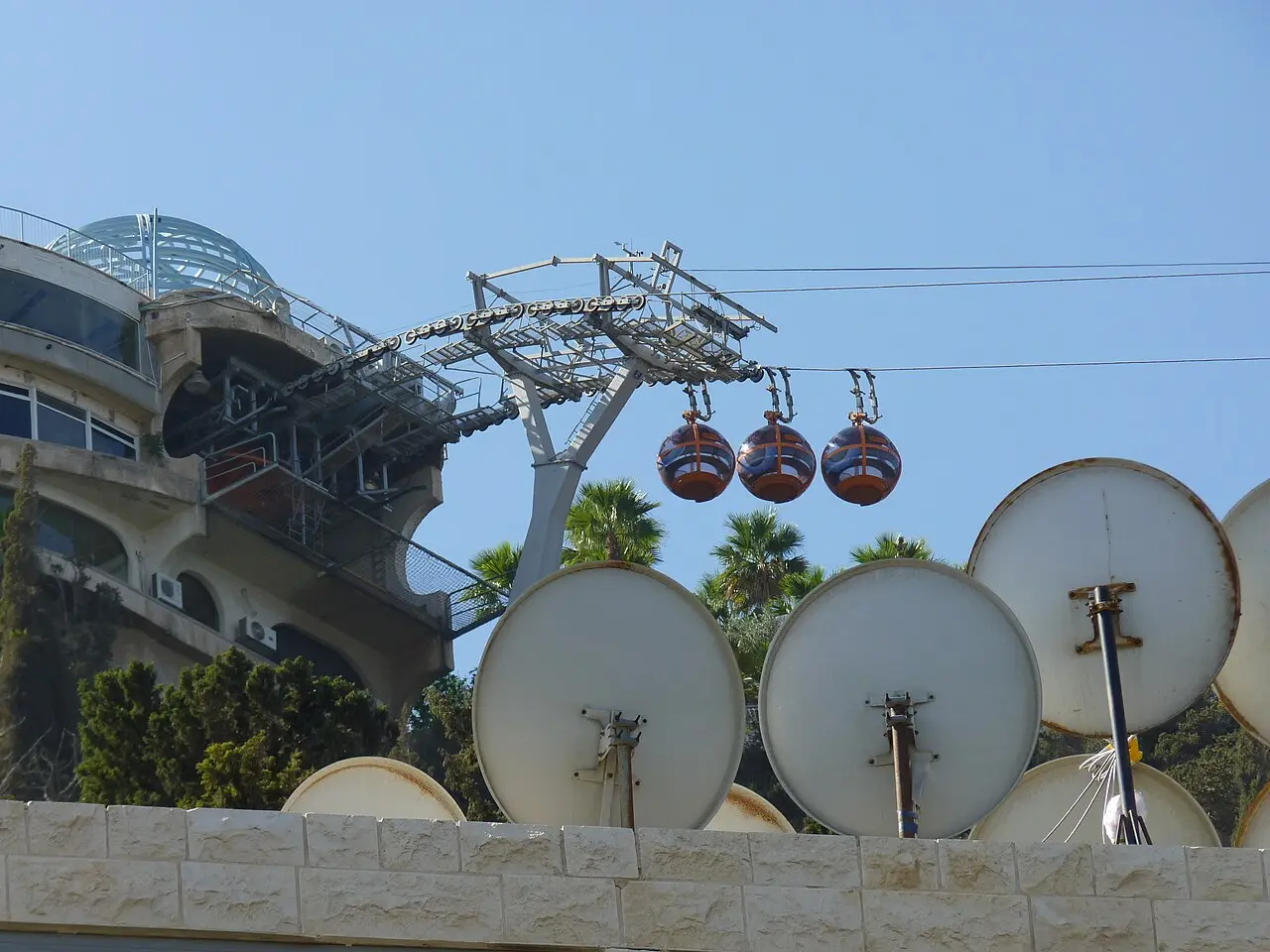 The cable car's lower station at Bat Galim, three cabins leaving it