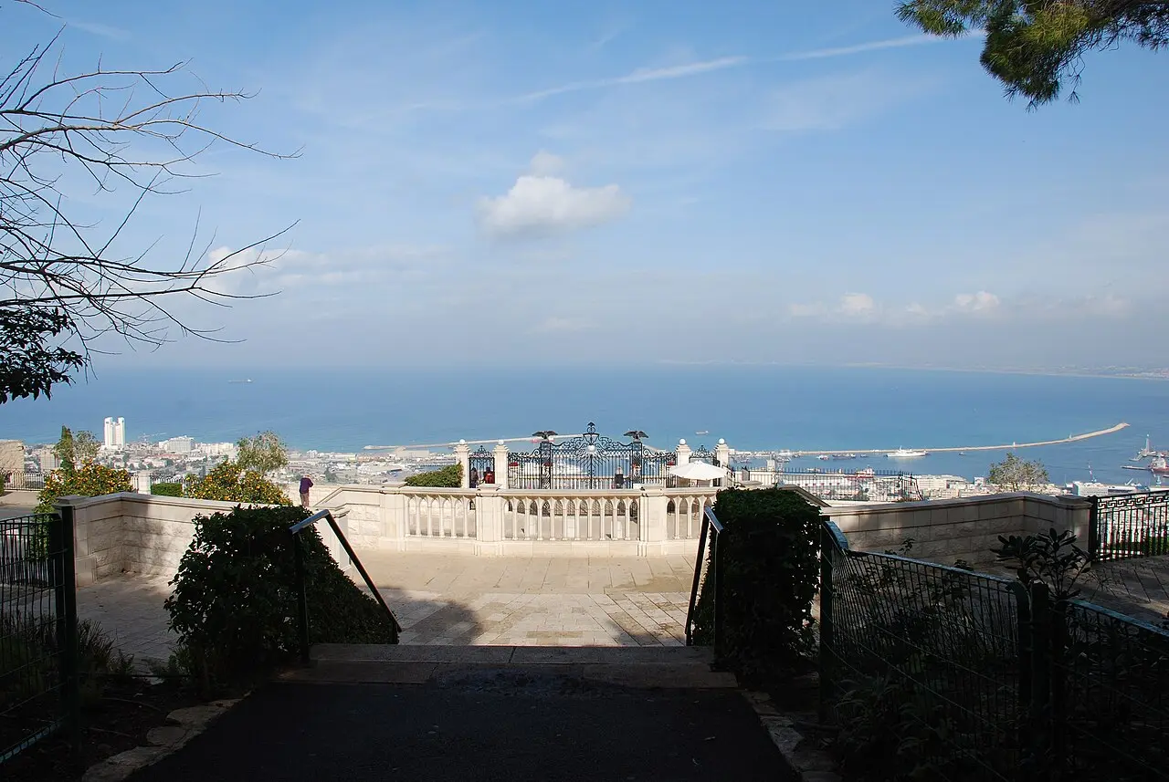 The view down the terraced gardens to Haifa Bay from the balcony at the top