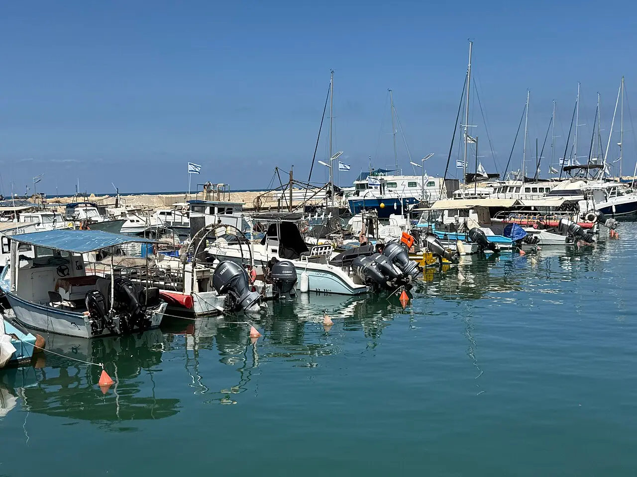 Fishing boats and yachts moored in Jaffa Port