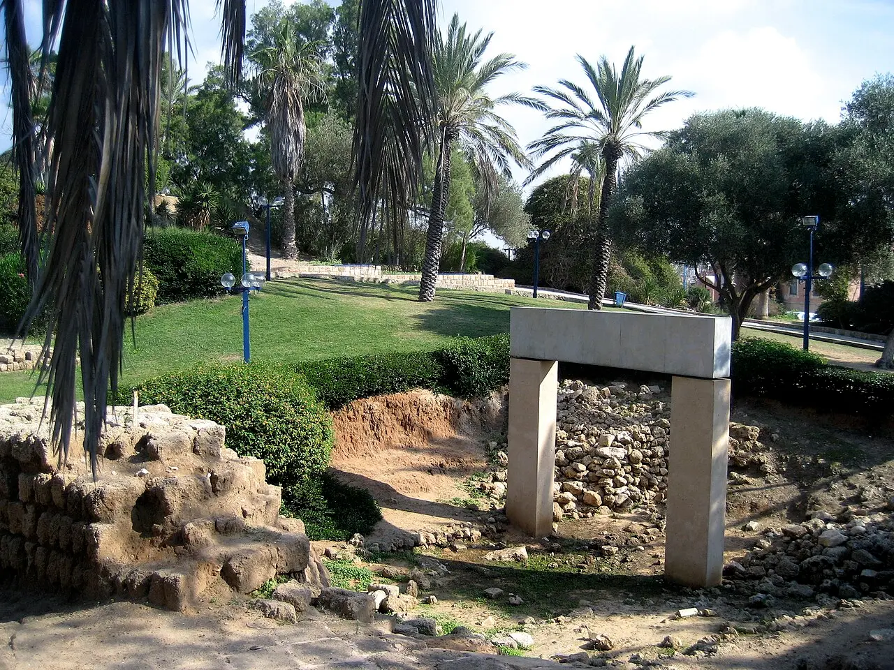 The gate replica seen across the lawns of the garden on Jaffa's hill