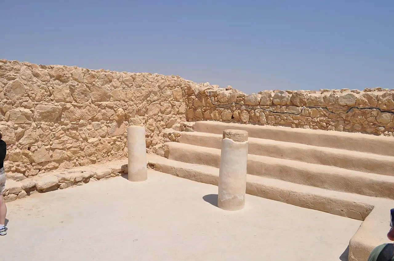 The tiered stone benches and column bases of the synagogue on Masada
