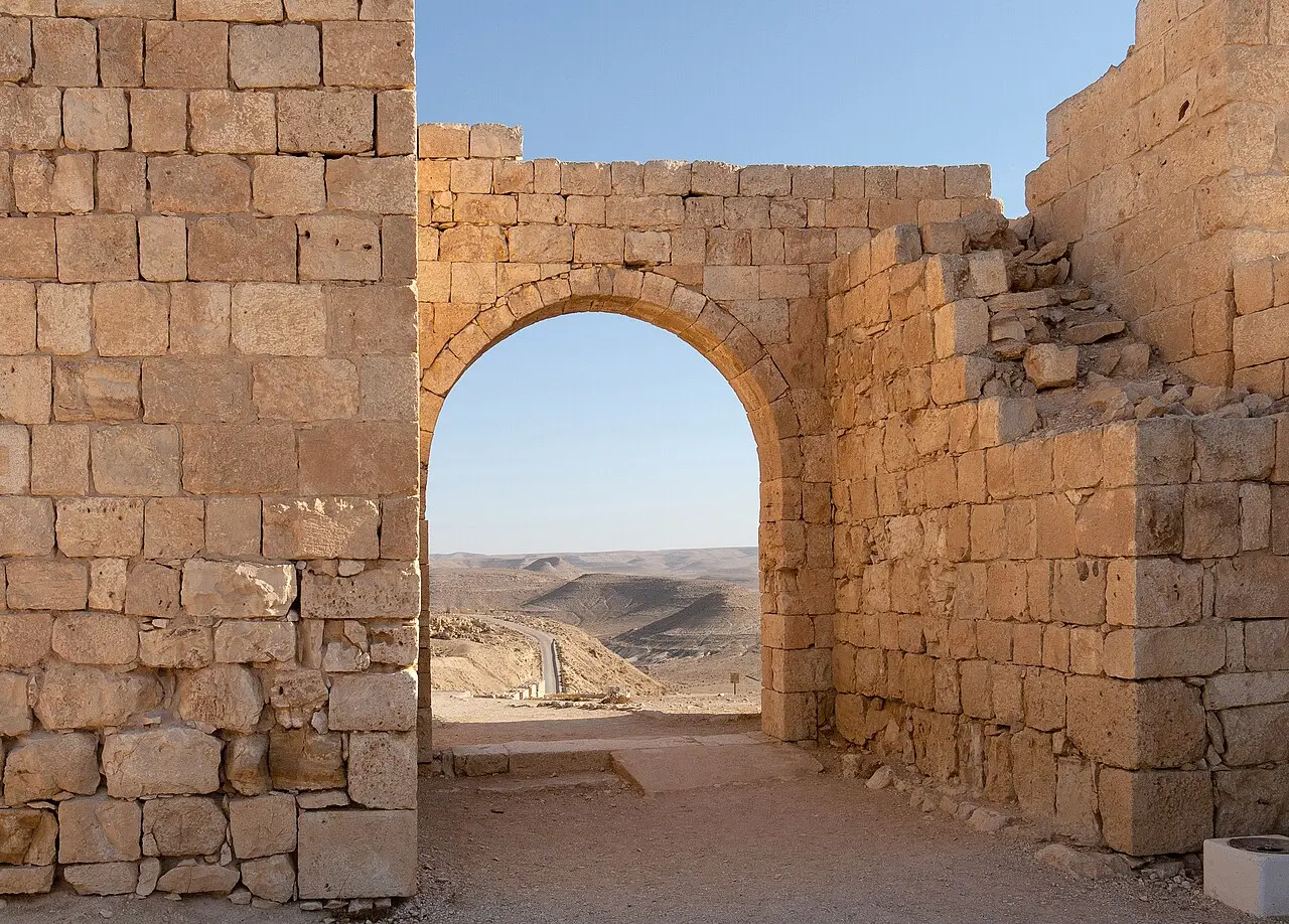 An arch at Avdat framing the desert below