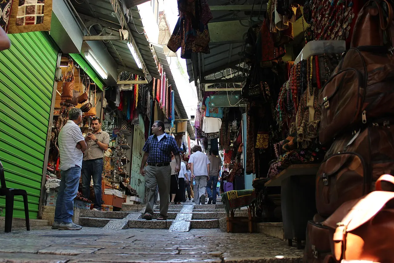 Shoppers in a covered lane of the Old City's souk