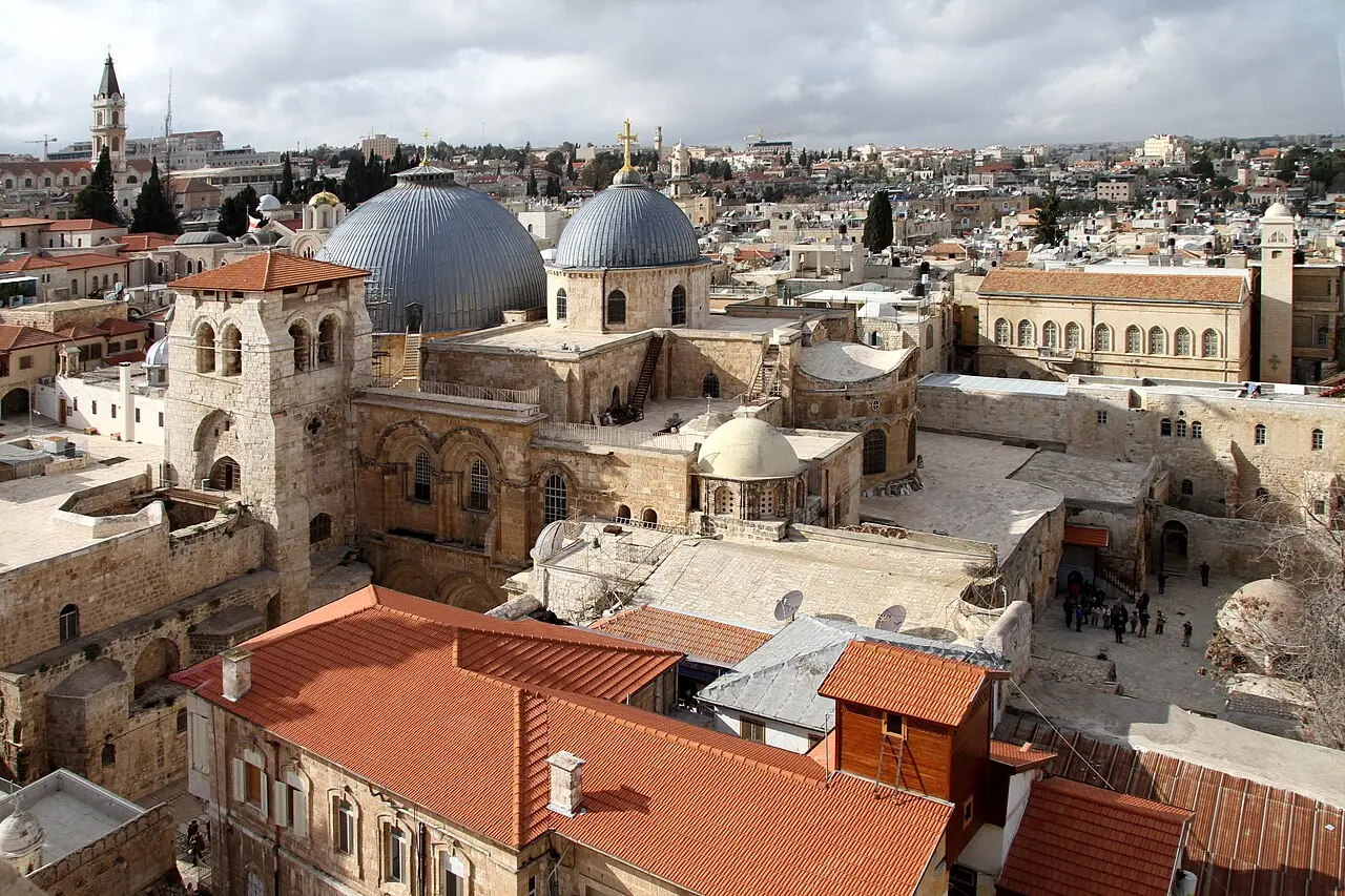 The two grey domes and the bell tower of the Church of the Holy Sepulchre, seen from the Redeemer church tower
