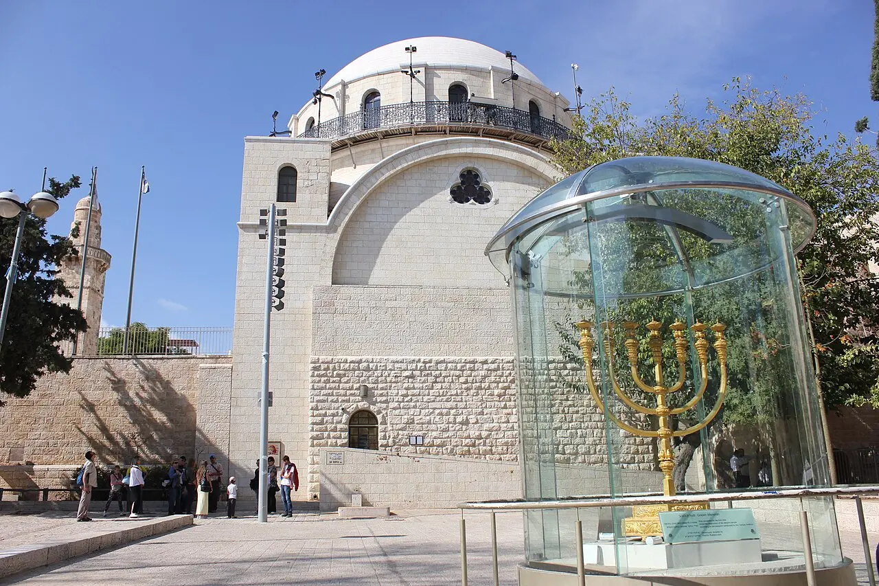 The Hurva Synagogue above the square, with the golden menorah in its glass case in front