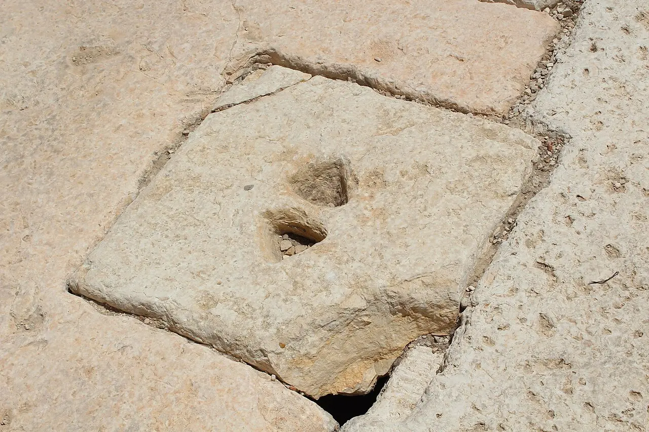 A worn paving slab in the archaeological park