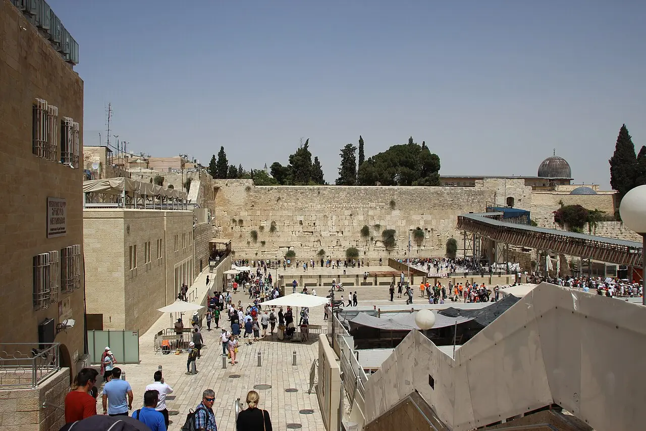 The Western Wall plaza from above, worshippers gathered at the foot of the wall