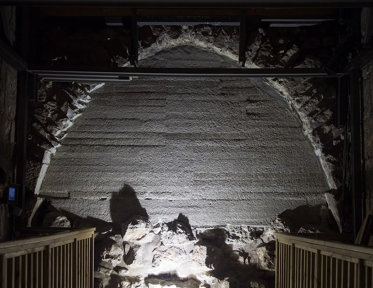 Massive stone courses lit in the Hall of Ages in the Western Wall Tunnels