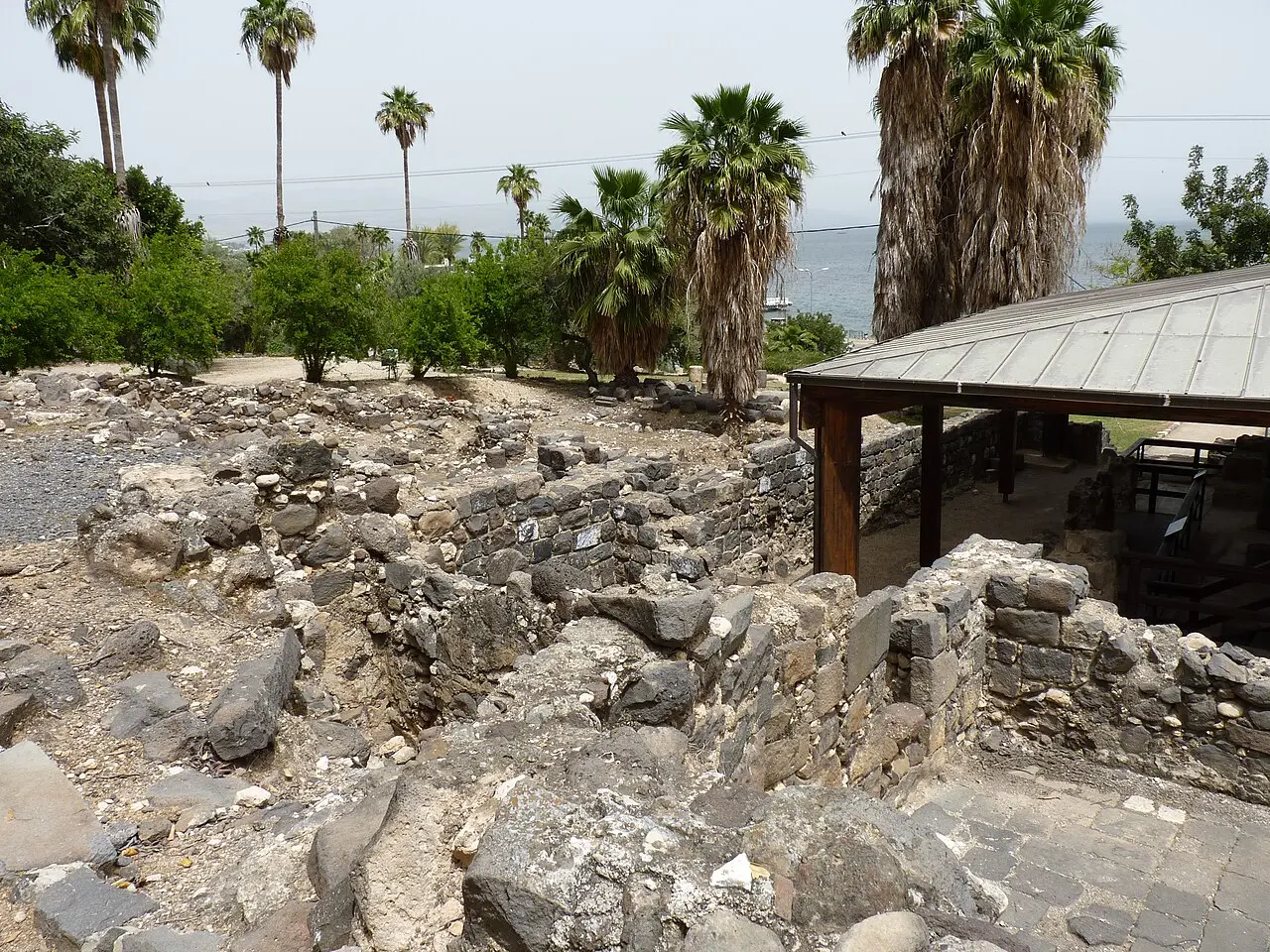 The excavated walls at Hamat Tiberias beside the shelter over the synagogue floor