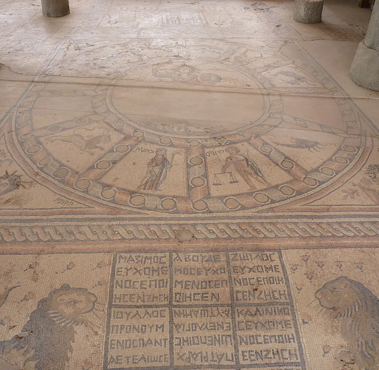 The zodiac wheel and the Greek dedication panels of the synagogue mosaic at Hamat Tiberias