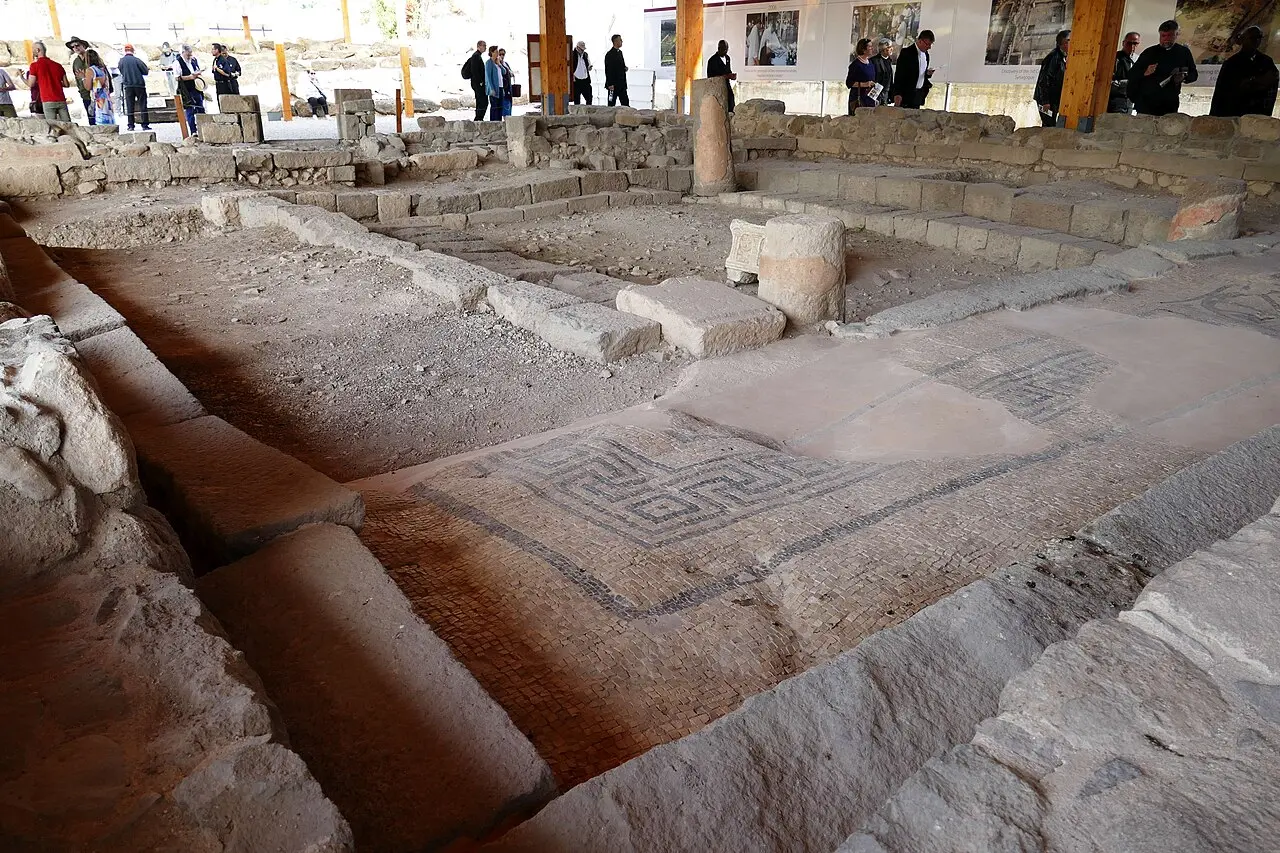 The synagogue's floor at Magdala, a meander-pattern mosaic along one side