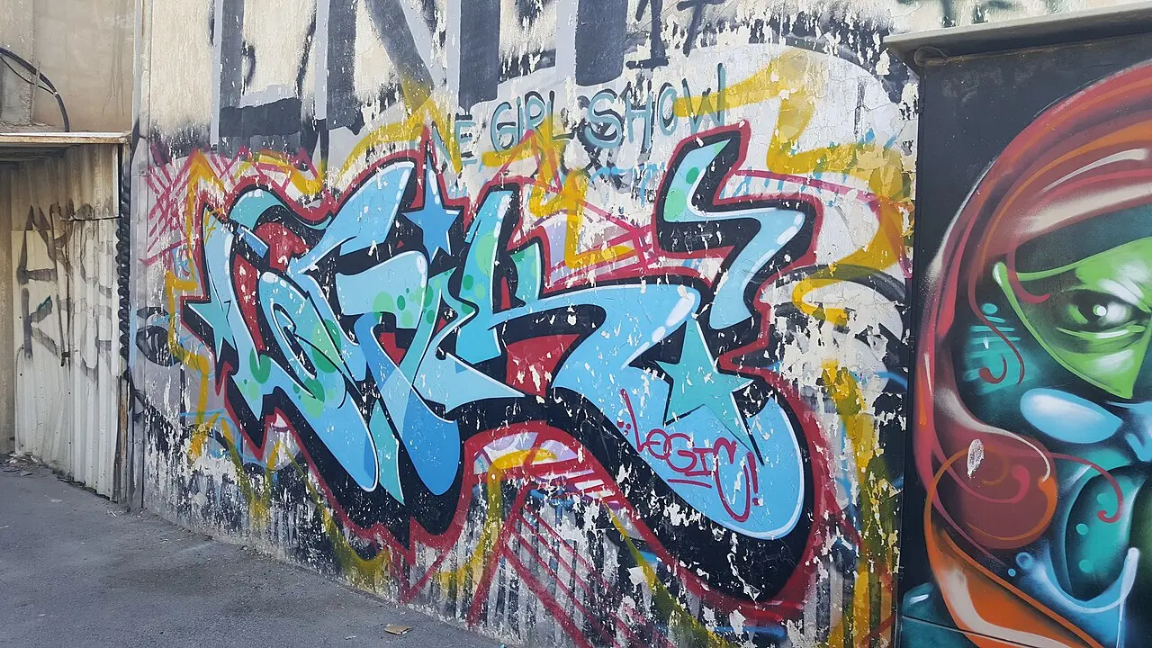 A wall covered in graffiti lettering in Florentin