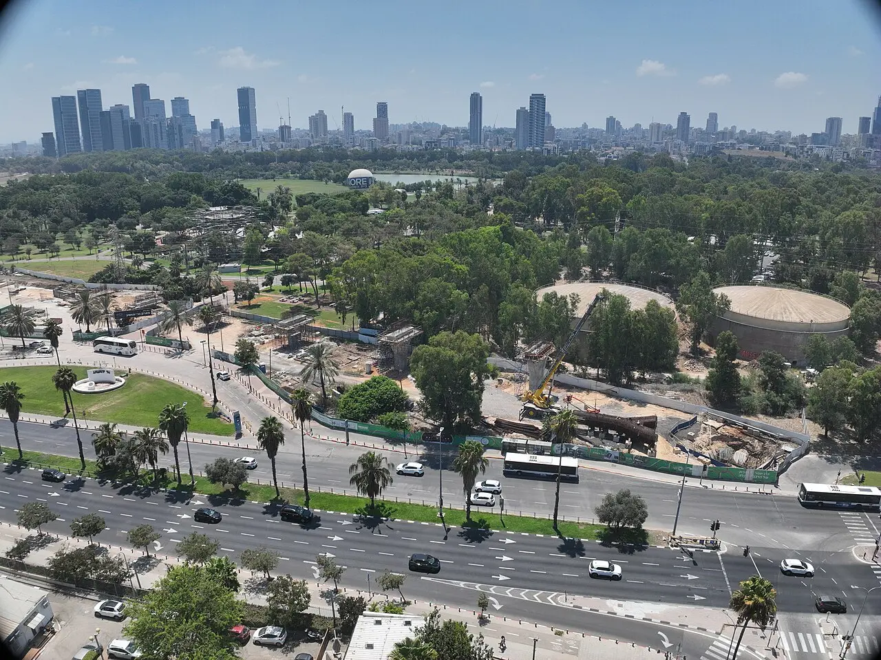HaYarkon Park from above in July 2024, the city's towers along the horizon